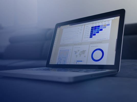 Laptop screen showing a dashboard that contains data from Quarterly Business Reviews (QBRs)